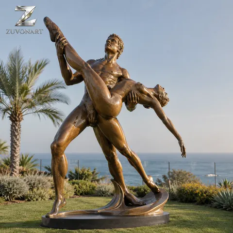 Two dancers form an elevated partnered pose with extended limbs.