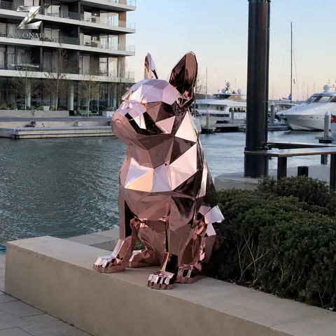 A compact French bulldog silhouette is rendered in crisp reflective facets.