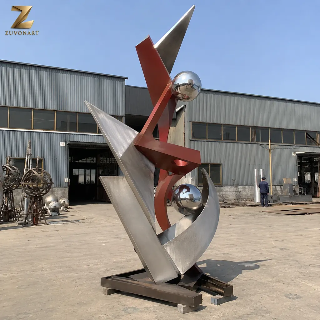 Red and silver angular planes frame a contrasting spherical element.
