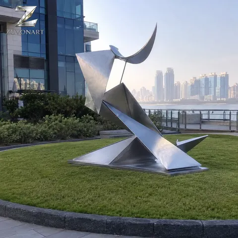 Folded angular planes suggest an upright bird with a long pointed profile.