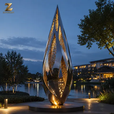 A pointed teardrop shell combines small perforations with an illuminated interior.